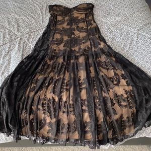 Strapless long dress with lace overlay.